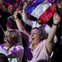 French voters propelled the far-right National Rally to a strong lead in first-round legislative elections Sunday and plunged the country into political uncertainty, according to polling projections. 