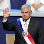 New Panamanian President Jose Raul Mulino waves before giving a speech at his swearing-in ceremony at the Atlapa Convention Centre in Panama City on Monday.